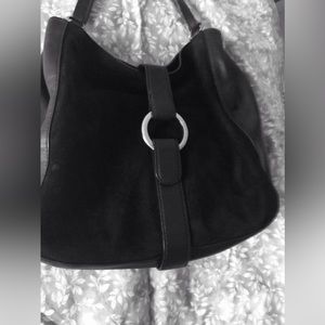 Michael Kors Black suede shoulder bag, adjustable strap. Bag has silver hardware